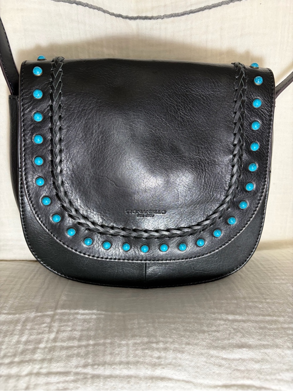Tignanello Mojave Black Leather Saddle Bag with Turquoise Studs